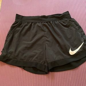Nike Womens Shorts with pockets.